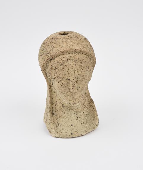 Votive female head, terracotta, hollow with open base