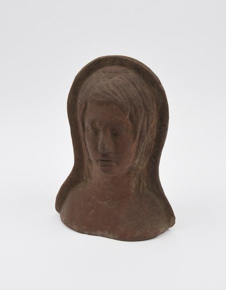 Votive female head