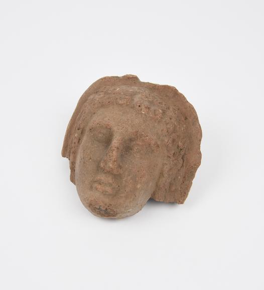 Votive female head, terracotta, hollow, without base