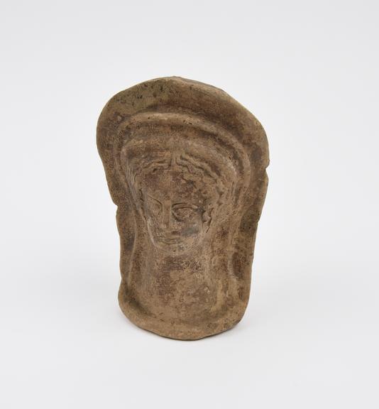 Votive female head