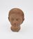 Votive head of boy, terracotta, probably Roman, 200BC-200AD