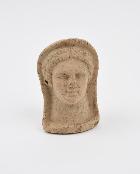 Votive head, terracotta, Roman(?), 400BC-1BC