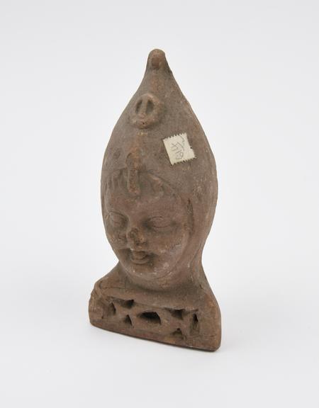 Votive child's head, terracotta, possibly Roman, 200BC-200AD