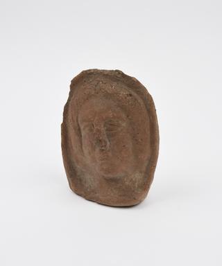 Votive head, terracotta, possibly Roman, 400BC-1BC