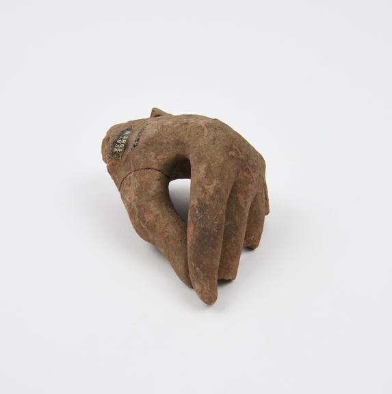 Votive left hand, terracotta, probably Roman, 200BC-200AD