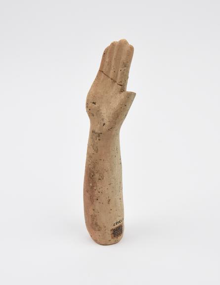 Votive right arm, terracotta, Roman, 200BC-200AD