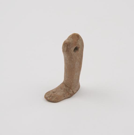 Votive lower half of left leg and foot, terracotta