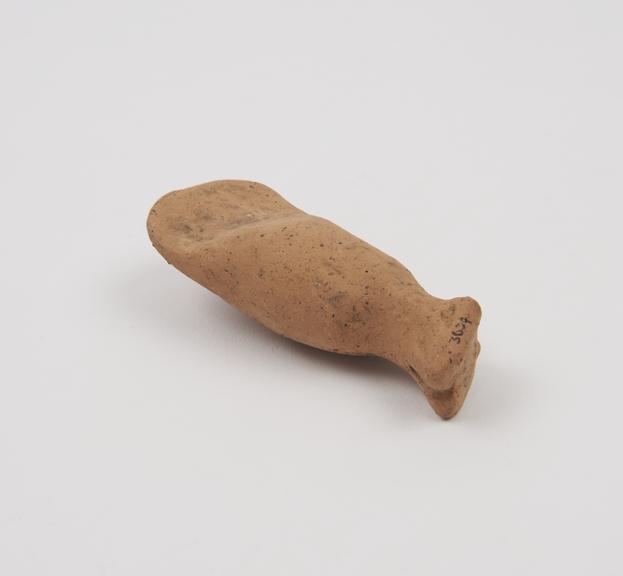 Small terracotta votive limb (?), possibly a leg