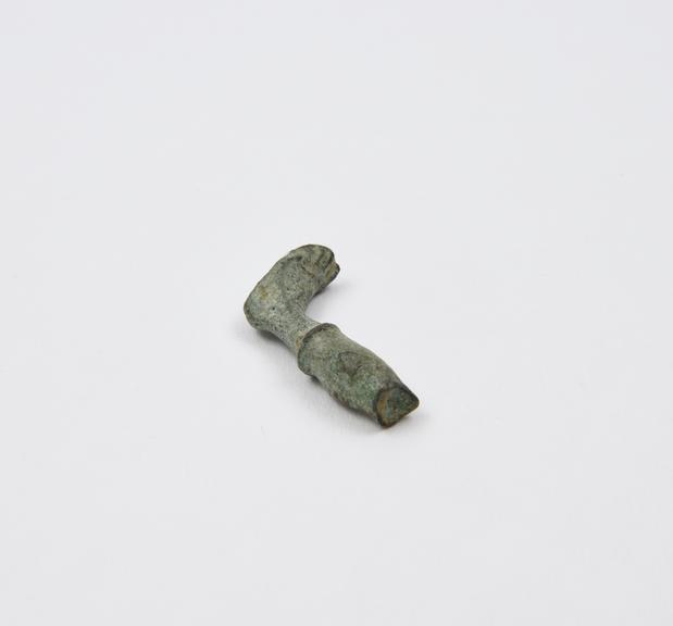 Small solid bronze left foot and lower leg, probably Roman