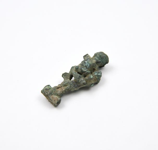 Small bronze figure of cherub-like male in tree, poor condition