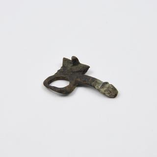Amuletic pendant in form of priapic cross