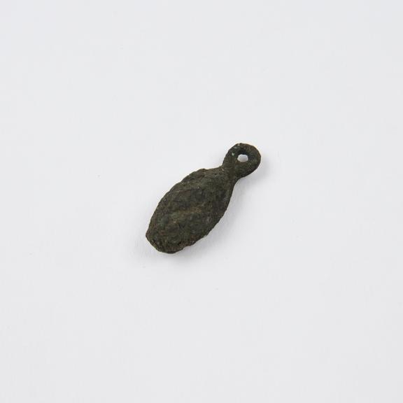 Small solid bronze amulet
