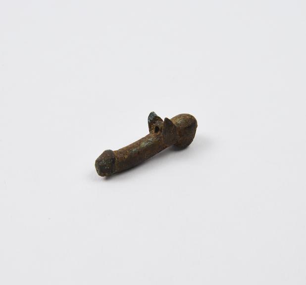 Amuletic bronze pendant in form of winged priapus