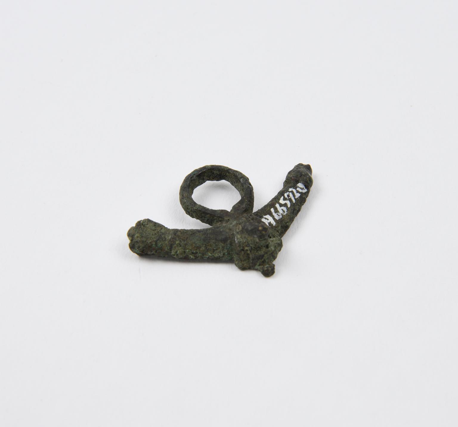 Phallic Rifle Bronze phallic pendant | Science Museum Group Collection