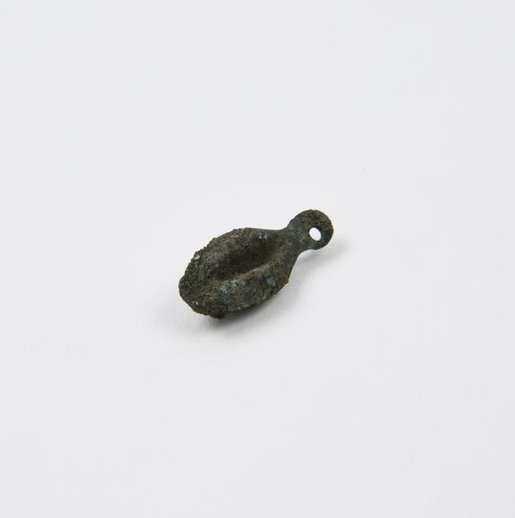 Small solid bronze amulet