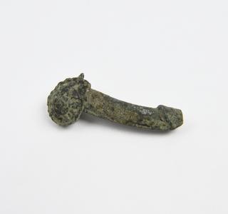 Solid bronze amulet in form of priapus emerging like snail from shell