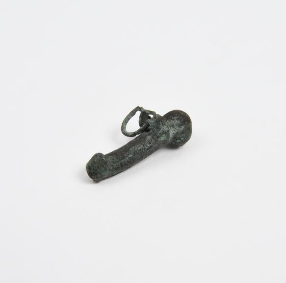 Small bronze pendant amulet in form of winged priapus