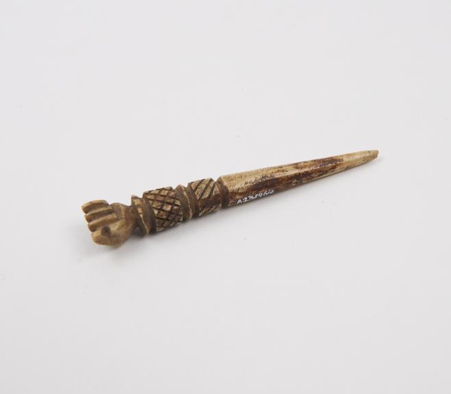 Bone hairpin (?) with decorated handle, incomplete