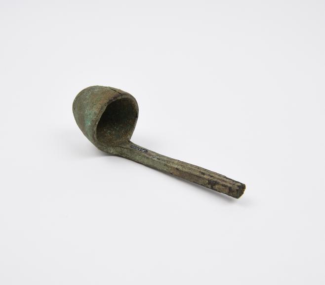 Bronze ladle with engraved lotus, encrusted, Graeco-Egyptian