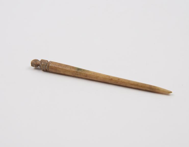 Hairpin, bone, head decorated with laureate bust (hairpin)