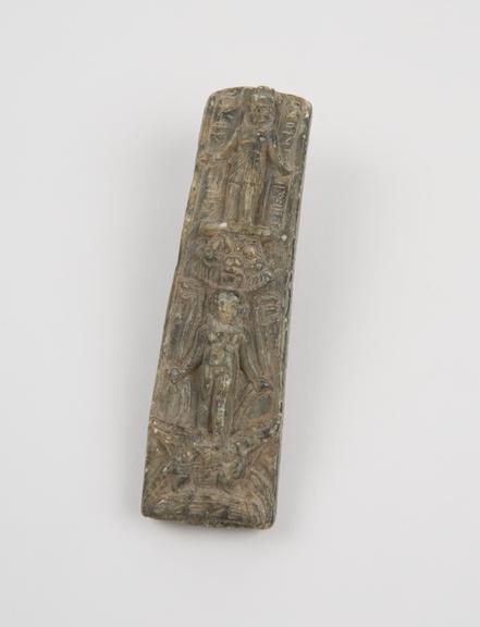 Relief tablet depicting human figures