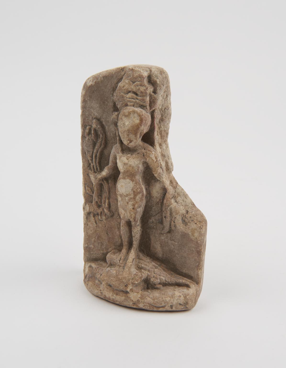 Relief tablet showing human and crocodile | Science Museum Group Collection