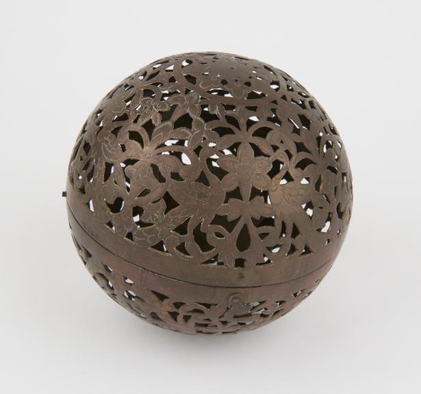 Pierced brass incense burner, with cup supported in gimbal