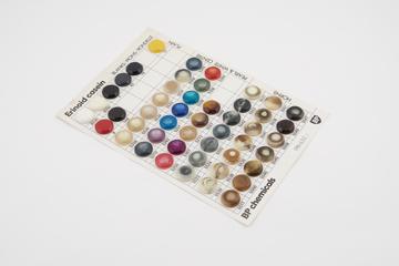 Sample card of coloured casein