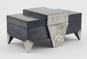 Rectangular box of blue casein with silver painted moulded decoration and feet