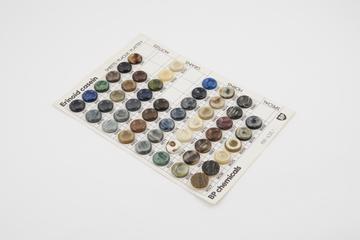 Sample card of coloured casein