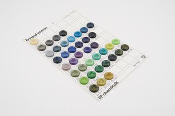 Shade card of coloured casein samples