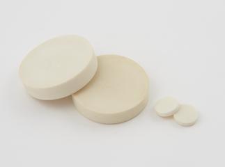 Unpolished casein button