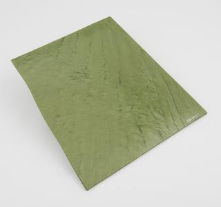Polished sheet of green casein, one of two pieces