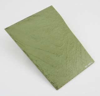 Polished sheet of green casein, one of two pieces