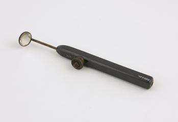 Adjustable laryngeal mirror with vulcanite handle | Science Museum ...