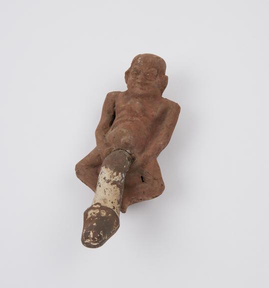 Hollow terracotta male figure with removable priapus