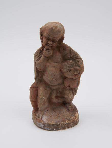 Hollow terracotta phallic figure (statue)