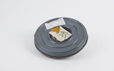 Film canister entitled: 'The First Atlas at  Manchester'