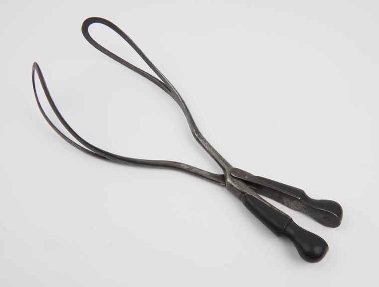 Forceps, obstetrical, steel and ebony, by Reay and Robinson