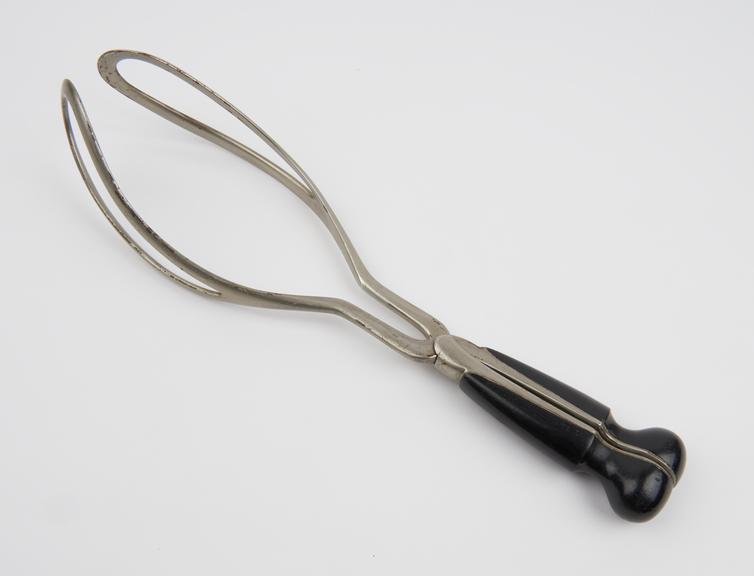 Forceps, obstetrical, metal, nickel plated, ebony handles