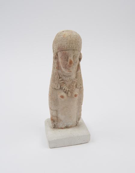 Female statue, head and torso, terracotta, Roman (?)