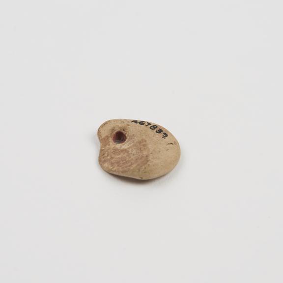 Amuletic pendant of terracotta, possibly Roman