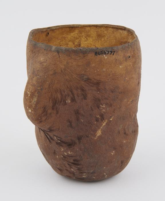 Thick animal hide container, beaker-like, small traces of hair