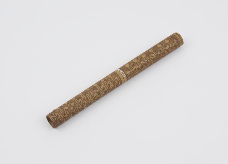 Nose stick consisting of cylindircal piece of bamboo