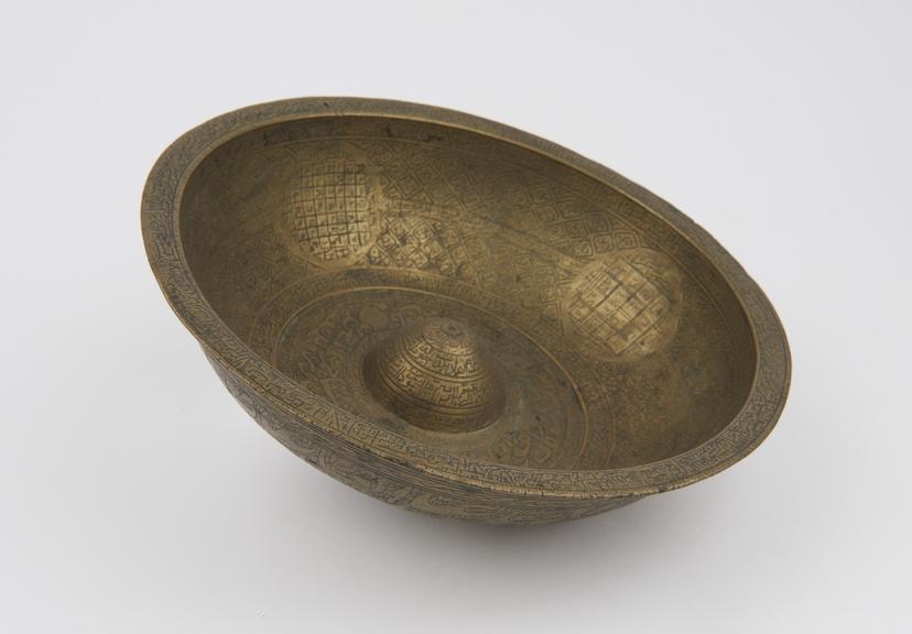 Brass divination bowl, engraved with arabic texts, Persian