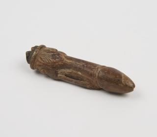 Carved bone(?) amulet