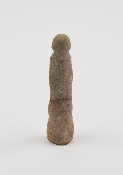 Amulet in form of terracotta priapus, repaired