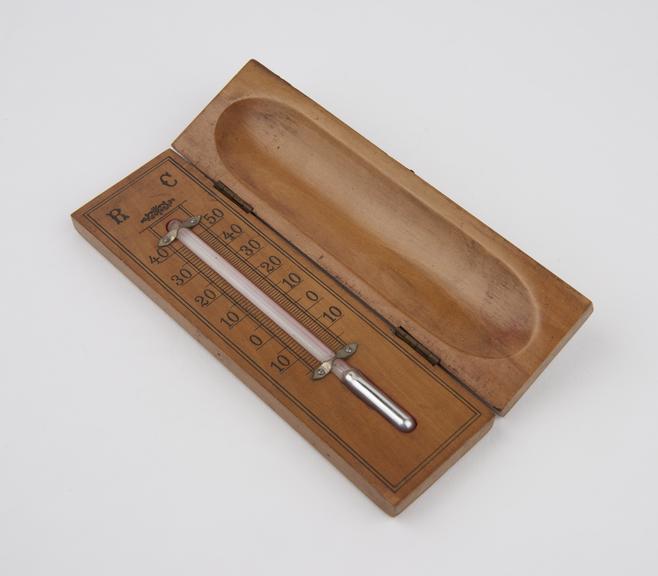 Small mercury thermometer in hinged wooden case; Centigrade and