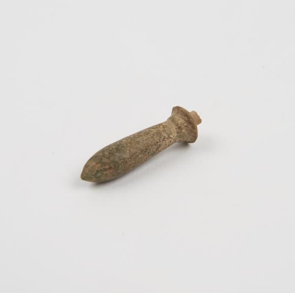 Small faience amulet, phallic, shaped like bomb