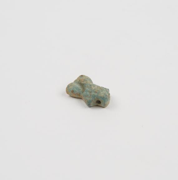 Small phallic pendant of bllue faience